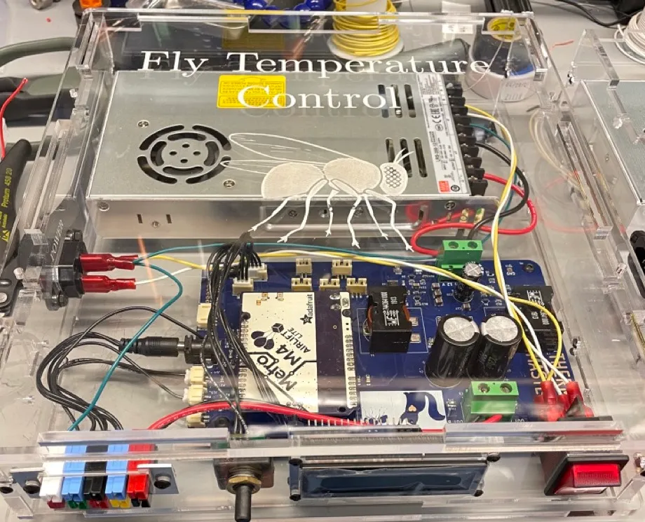 Fly temperature controller electronics in a clear enclosure